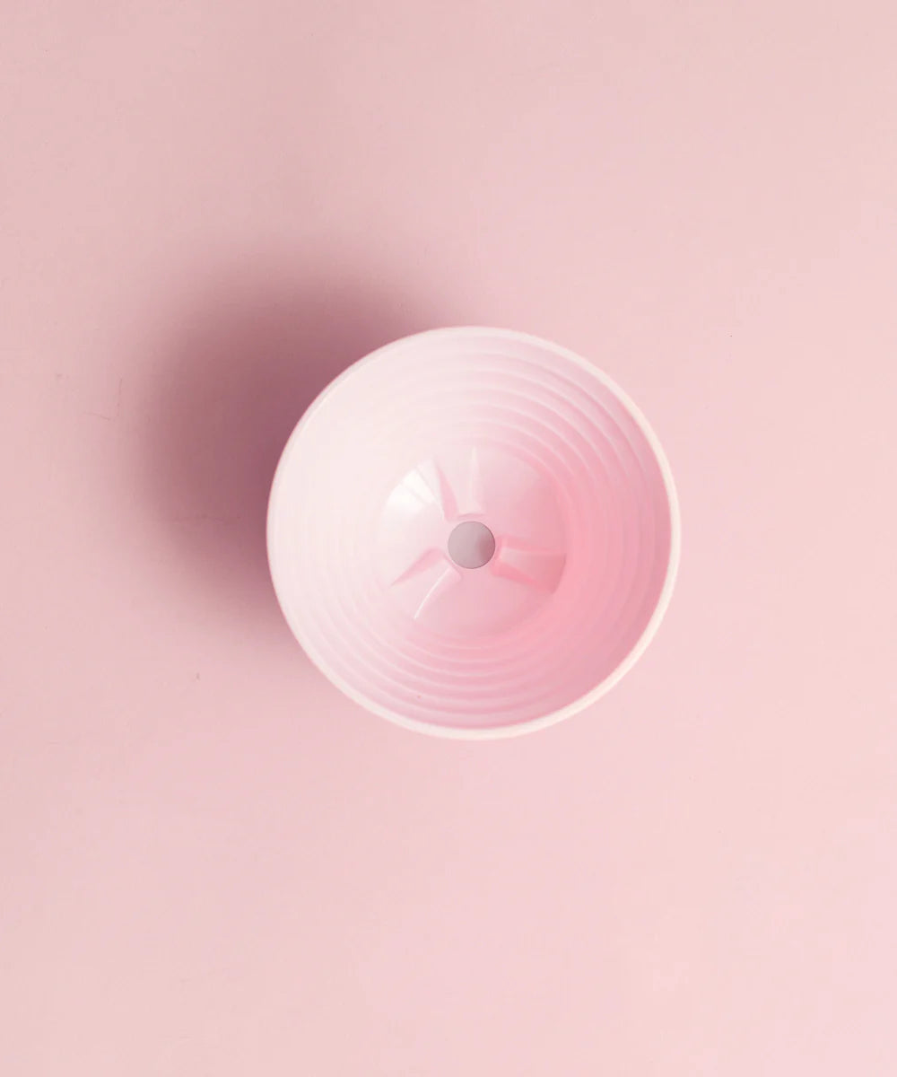 Pink April Brewer 2.0 flat bottom pour over coffee dripper designed in Copenhagen for clean and balanced home coffee brewing